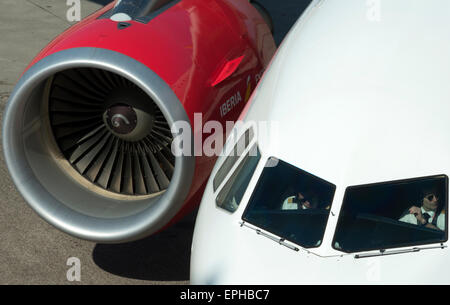 Pilots in cockpit of Iberia Express Airbus A320 airliner, Dusseldorf International airport Germany Stock Photo