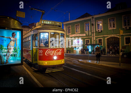 Tram 15 in Lisbon Portugal with coca cola advert on the front Stock Photo