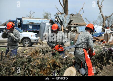 Delmont, South Dakota, USA. 17th May, 2015. Members of the 114th Civil Engineer Squadron of the South Dakota Air National Guard assist with clean up of debris following a EF-2 tornado May 17, 2015 in in Delmont, S.D. Credit:  Planetpix/Alamy Live News Stock Photo