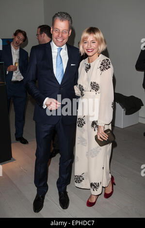 'Inside Rolls-Royce' exhibition - VIP preview held at the Saatchi Gallery  Featuring: Sienna Miller, Torsten Muller-Otvos, CEO RR Where: London, United Kingdom When: 13 Nov 2014 Credit: Daniel Deme/WENN.com Stock Photo