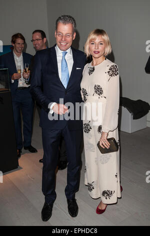 'Inside Rolls-Royce' exhibition - VIP preview held at the Saatchi Gallery  Featuring: Sienna Miller, Torsten Muller-Otvos, CEO RR Where: London, United Kingdom When: 13 Nov 2014 Credit: Daniel Deme/WENN.com Stock Photo