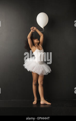Pretty little ballet dancer with the balloon Stock Photo