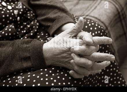 Hands of the elderly woman Stock Photo