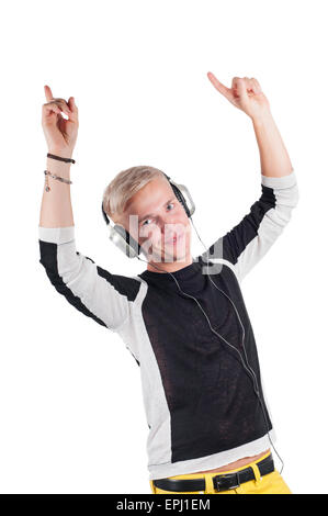 Young handsome guy dancing with headphones Stock Photo