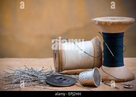 two spools of thread with thimble Stock Photo
