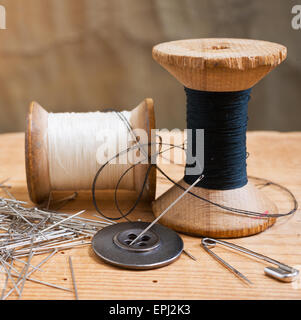 two spools of thread with thimble Stock Photo