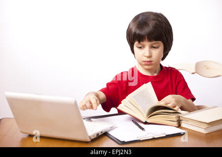 schoolboy doing homework Stock Photo