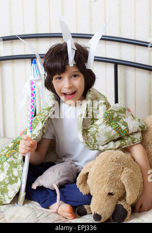 boy plays in the American Indian Stock Photo