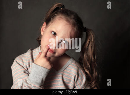 Portrait 5 years girl in studio Stock Photo