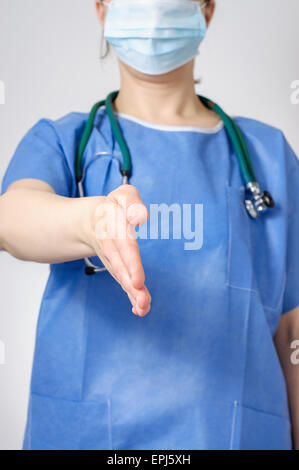 Close up of doctor giving her hand for handshake Stock Photo