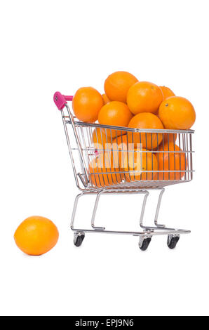 Supermarket trolley full of oranges isolated on white Stock Photo