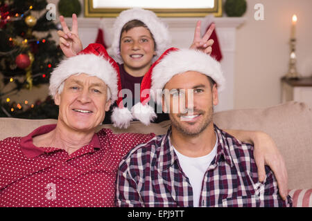 Son joking to his father and grandfather Stock Photo