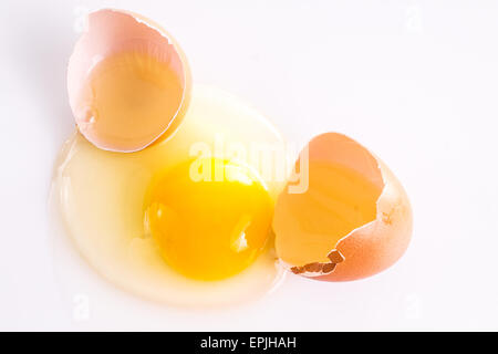 Cracked Egg with Shell Isolated on White Stock Photo