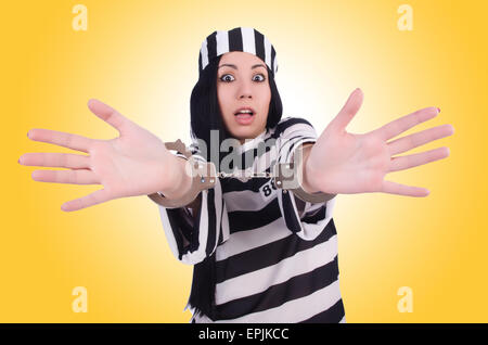 Prisoner in striped uniform on white Stock Photo