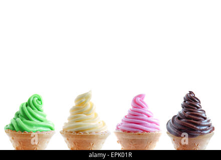 Ice cream cones in a row over a white background Stock Photo