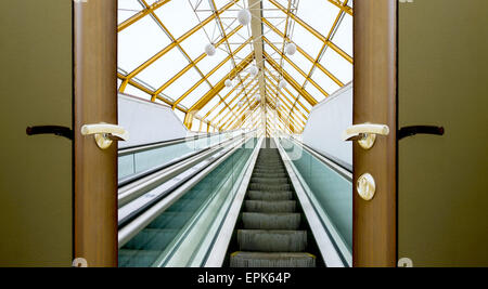 escalator stairs open door Stock Photo