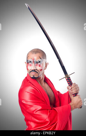 Man with sword isolated on white Stock Photo
