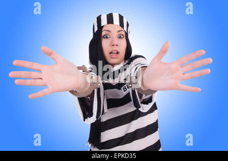 Prisoner in striped uniform on white Stock Photo