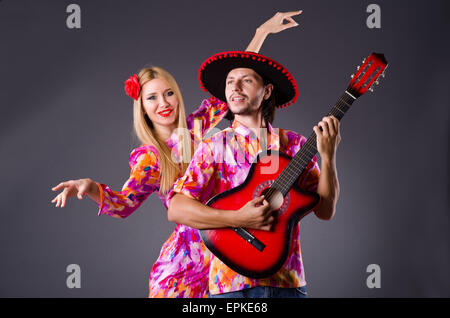Spanish pair playing guitar and dancing Stock Photo