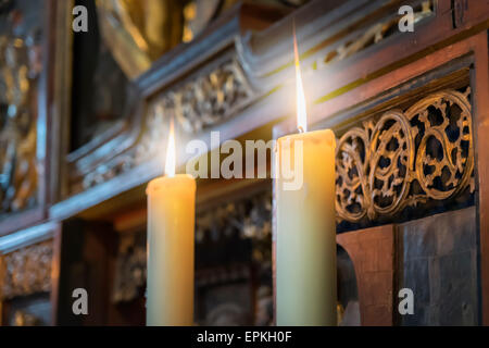 Image of two burning candles in an church Stock Photo
