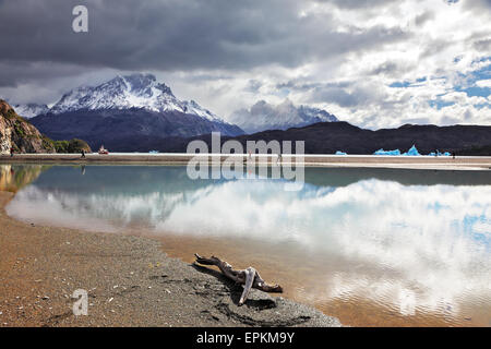 Clouds are reflected in ice water Stock Photo