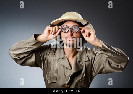 Funny safari hunter against background Stock Photo - Alamy