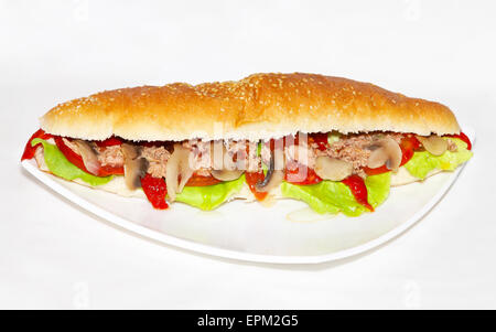 Big juicy sandwich at white plate Stock Photo
