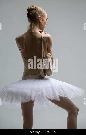 Portrait of young ballerina in white tutu Stock Photo