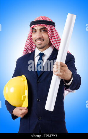 Arab engineer with drawings on white Stock Photo