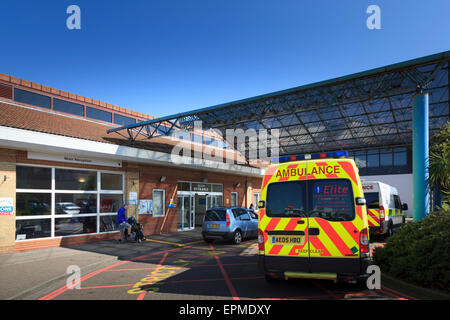 Ambulance parked outside main entrance of Worthing Hospital Stock Photo