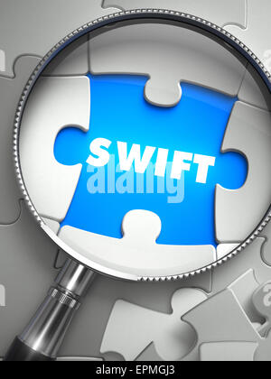 SWIFT - Society for Worldwide Interbank Financial Telecommunications - through Lens on Missing Puzzle Peace. Selective Focus. 3D Stock Photo