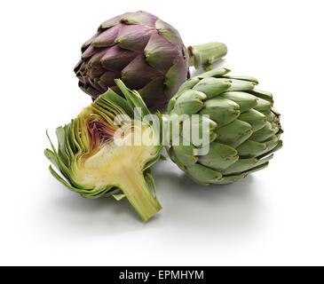 whole and half cut artichoke isolated on white background Stock Photo