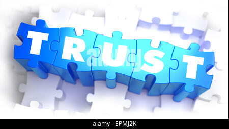 Trust - White Word on Blue Puzzles on White Background. 3D Illustration. Stock Photo