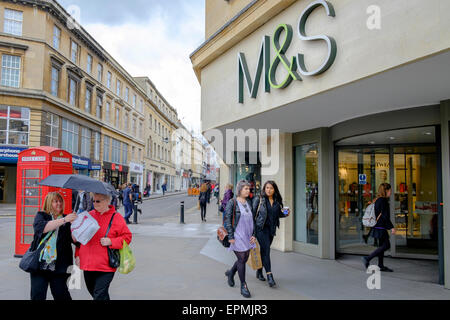Bath, UK, 19th May, 2015. Pedestrians are pictured walking past a Marks & Spencer store in Bath on the day before the Marks & Spencer Group announces it's full year results. Credit:  lynchpics/Alamy Live News Stock Photo