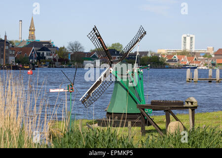 Windmills at Zaanse Schans, Working old Dutch windmills along the river De Zaan Stock Photo