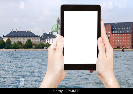 travel concept - tourist photograph waterfront, Marble Church and The Royal Cast Collection in Copenhagen, Denmark on tablet pc Stock Photo