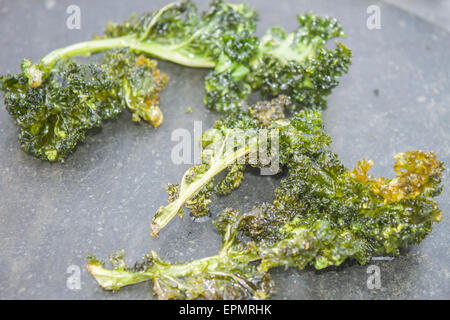 Deep fried kale, on a stone plate Stock Photo