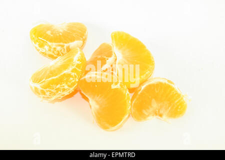 Orange mandarin sections, isolated on white background Stock Photo