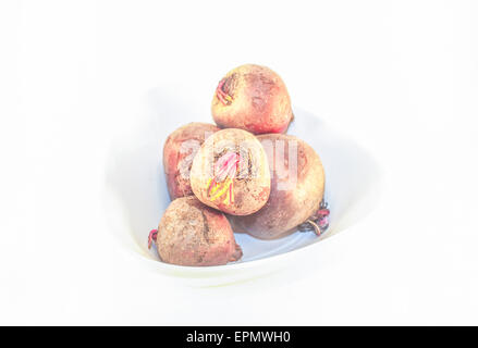 A bowl full of purple beetroot, isolated on white background Stock Photo