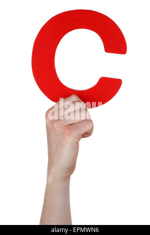 Hand holding letter C from alphabet isolated on a white background Stock Photo