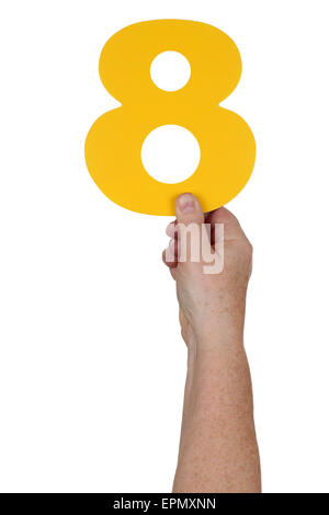 Hand holding number 8 isolated on a white background Stock Photo