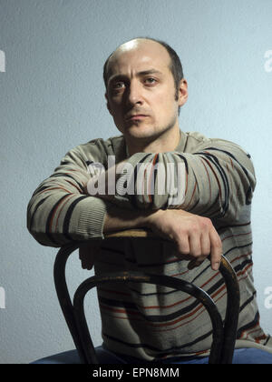 Emotional bald man. 19th Feb, 2014. Sad © Igor Golovniov/ZUMA Wire/ZUMAPRESS.com/Ģ����ý Live News Stock Photo