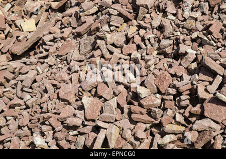 Background of a stack of red limestone brick stones Stock Photo