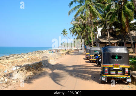 Varkala is town in Thiruvananthapuram district situated in the Indian state of Kerala. Rickshaws parked at Varkala beach. Stock Photo