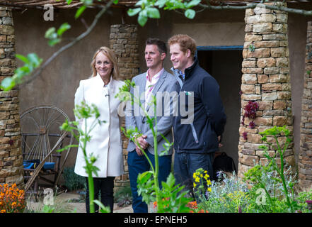 HRH Prince Harry at the 'Sentebale - Hope in Vulnerability' garden at RHS Chelsea  with Matt Keightley and Louise Minchin. Stock Photo