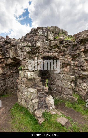 Feature in the old stone walls of the medieval ruin of Beeston castle in Cheshire, England. Stock Photo