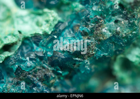 Chrysocolla is a hydrated copper cyclosilicate It has the chemical formula (Cu,Al)2H2Si2O5(OH)4nH2O.Cyan (blue-green) crystal. Stock Photo