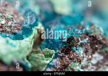 Chrysocolla is a hydrated copper cyclosilicate It has the chemical formula (Cu,Al)2H2Si2O5(OH)4nH2O.Cyan (blue-green) crystal. Stock Photo