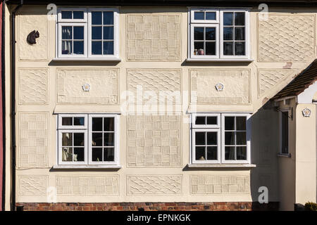 A village house with a chequerboard pattern of pargetting designs, Finchingfield, Essex, England, UK Stock Photo