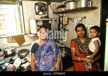 Typical kitchen scene at residential apartment building housing middle class Indian family in Mumbai/ Bombay, India's economic p Stock Photo